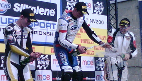 Dan Kneen takes the top step of the podium at the Thruxton round of the Supersport Cup series